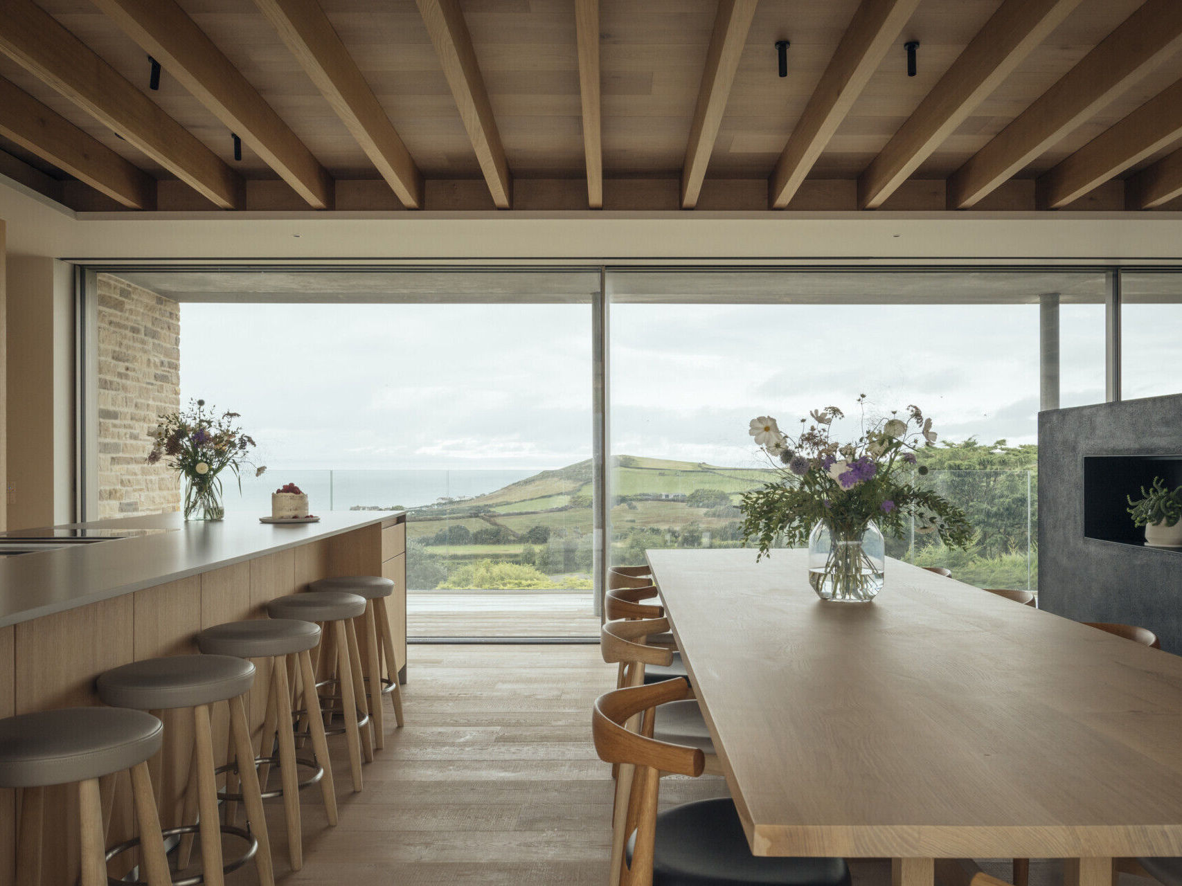 Inside A Stone House That Follows the Land